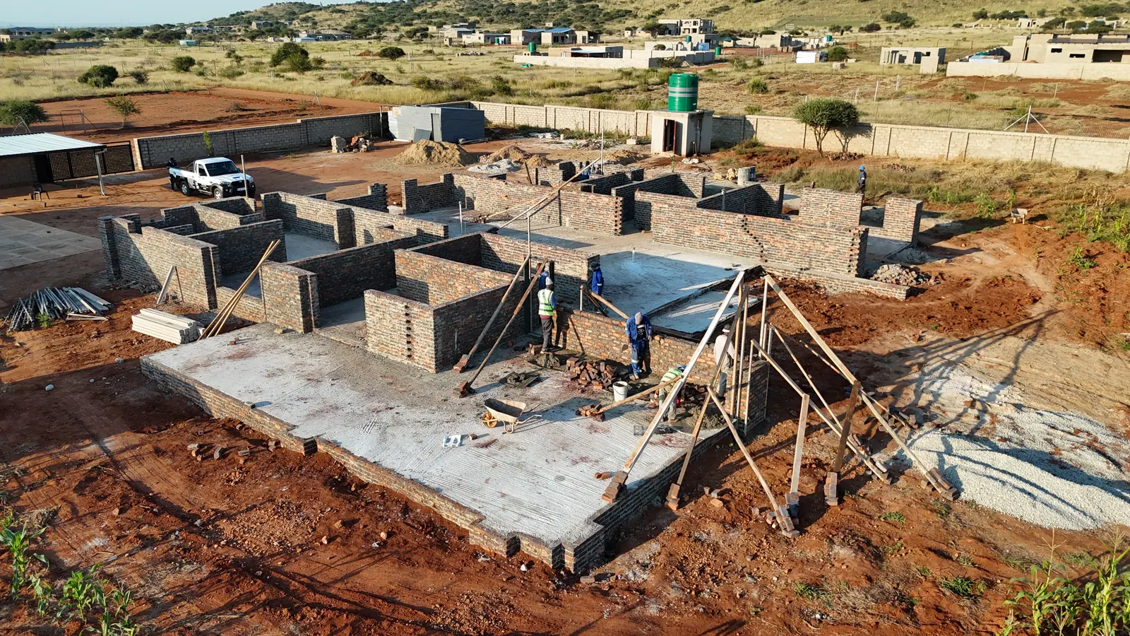 Aerial view of foundations and blockwork on the Mamahule Project site